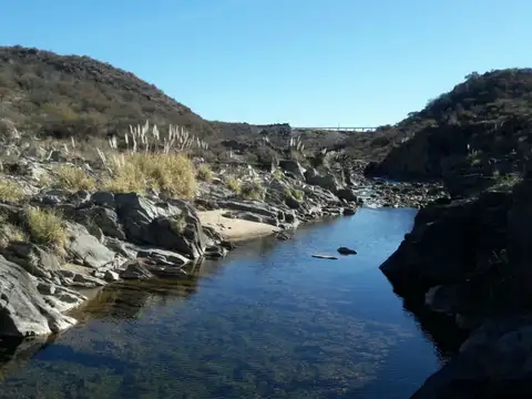 Excelente campo en Riocito, para no perder, bien turistico, con rio que lo bordea en su totalidad.