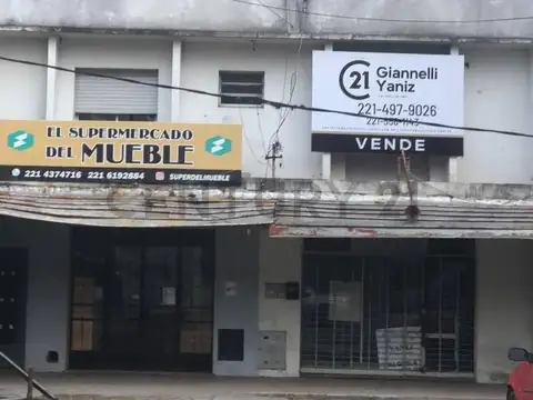 locales comerciales con amplio deposito y departamento en planta alta 2 dormitorios