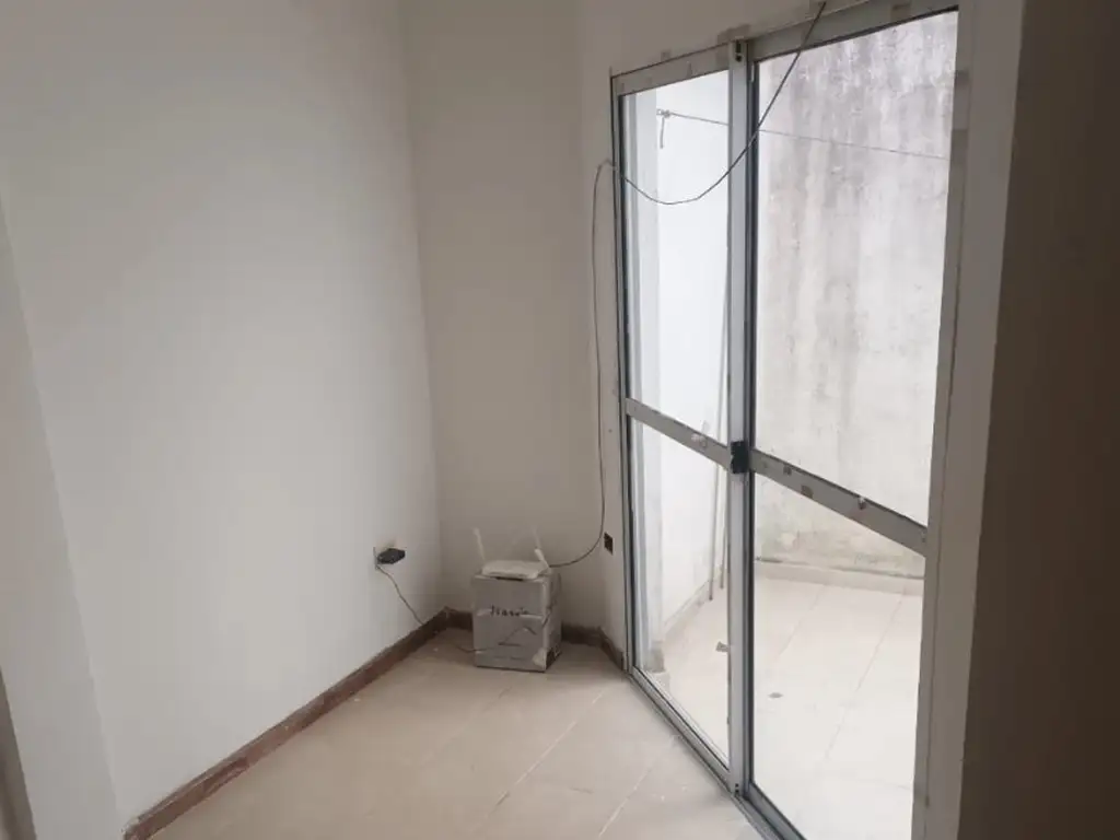 Departamento de 1 dormitorio en planta baja con patio