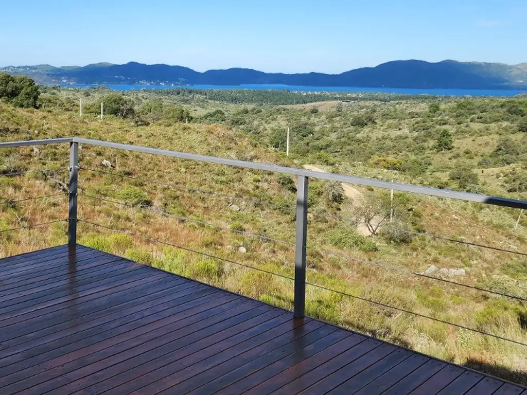 HERMOSA CASA MODULAR EN POTRERO DE GARAY CON ESPECTACULARES VISTAS AL LAGO -BARRIO LA CUNKA