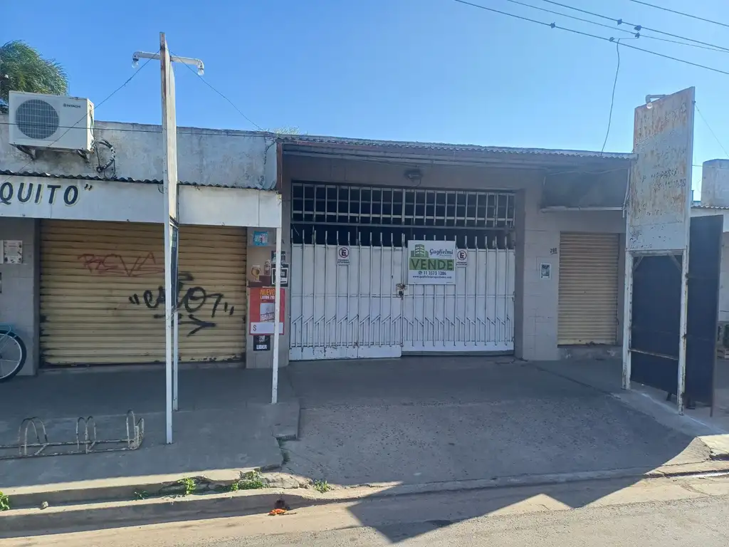 Parcela con galpón y dos locales comerciales. Barrio Lubo - Campana