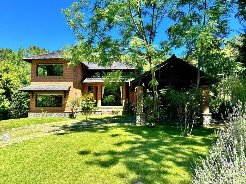 Casa alquiler Carilo 10 pax piscina climatizada