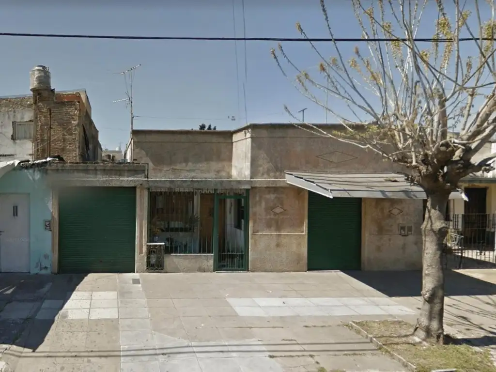 CASA LOTE PROPIO CON LOCAL Y GARAGE EN VILLA BALLESTER