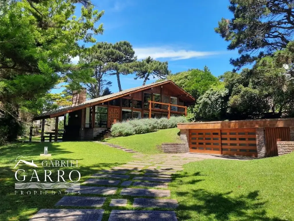 Hermoso Chalet estilo cabaña con vista al Golf.