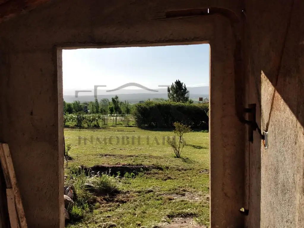 Casita a terminar en 1.000m2 de terreno en Los Reartes