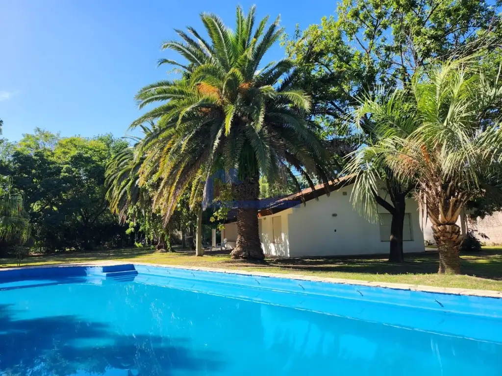 ALQUILER TEMPORARIO, FUNES - CASA 3 DORMITORIOS CON PISCINA