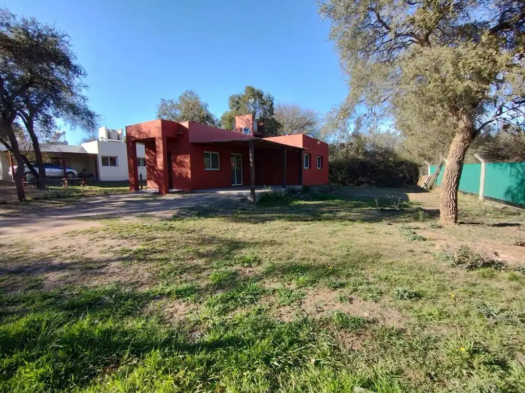 VENTA CASA DOS DORM. Y COCHERA EN HOUSING UNQUILLO