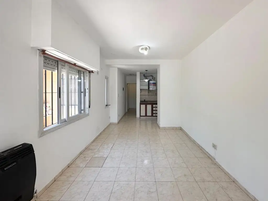 DEPARTAMENTO 2 AMB EN PLANTA BAJA CON COCHERA - MERLO CENTRO