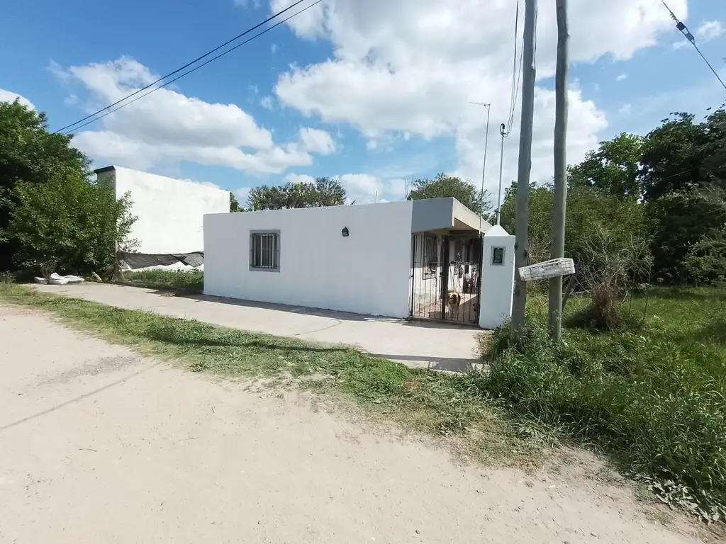 5 Departamentos + un lote baldio