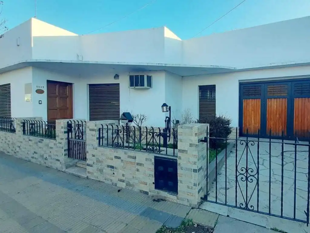 Casa y terreno en Roque Pérez