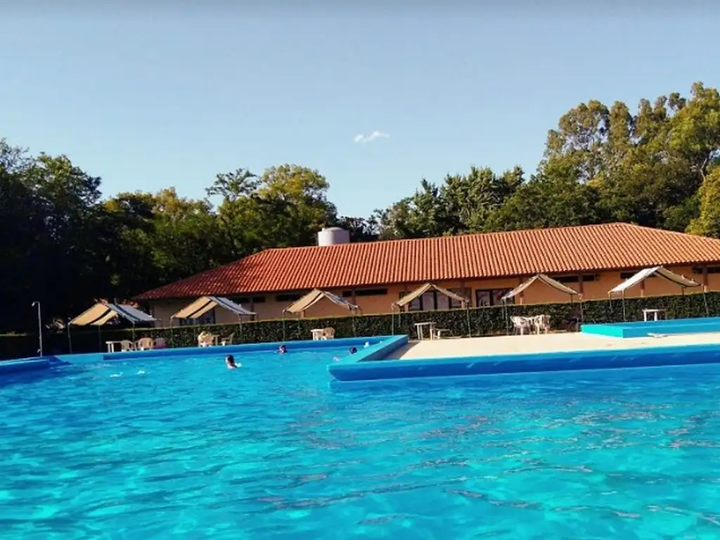 Áreas comunes piscina, club-house en Las Perdices Club de Campo