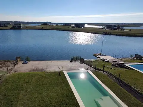 Casa en venta con renta, s/laguna, Costas, Puertos Escobar