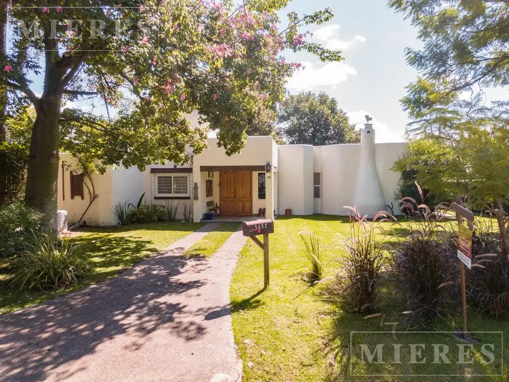 Excelente casa en venta al golf en Highland Park