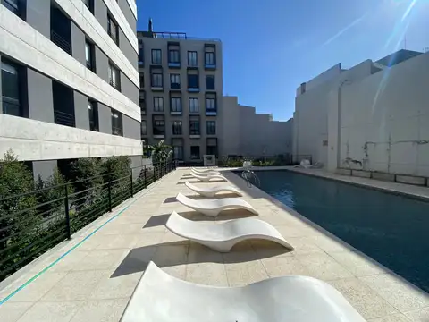 Departamento de 3 ambientes a estrenar con cochera y gran patio en Complejo de Torres full Amenities