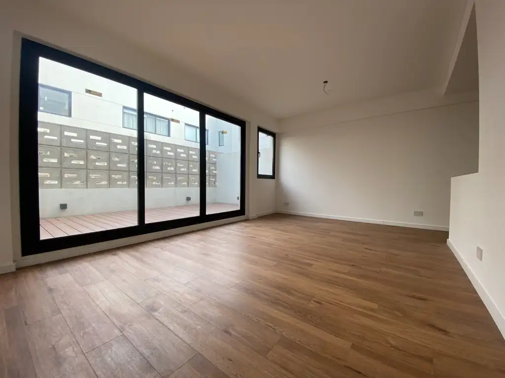 Vendo exclusivo PH 2 ambientes a estrenar con cochera fija/cubierta, gran patio con deck y parrilla