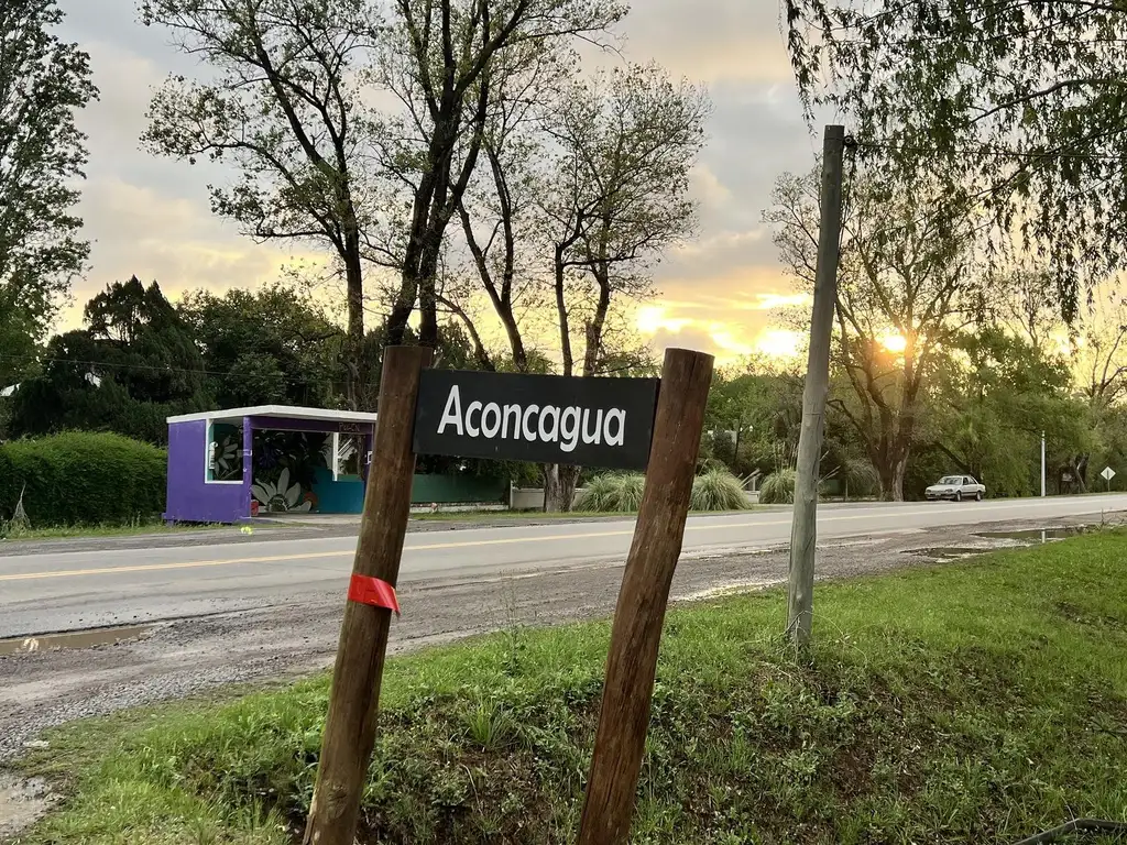 permuta por auto de alta gama Terreno en Roldan