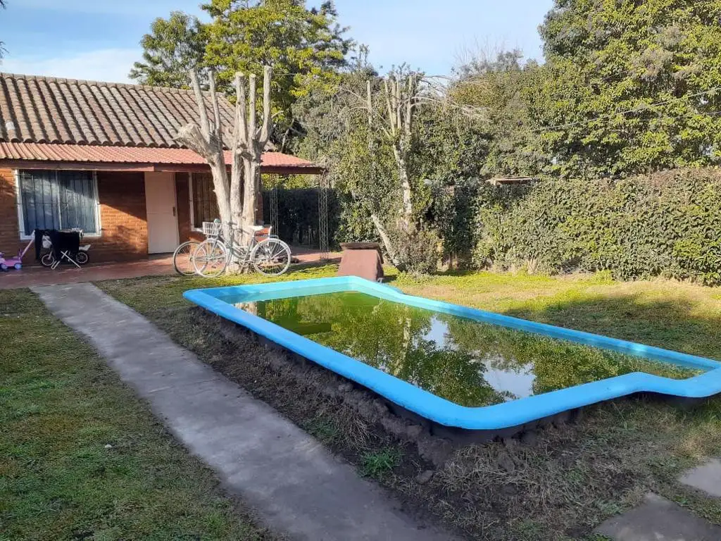 VENTA CASA 7 ambientes JARDIN - PISCINA - COCHERAS CUBIERTAS -LUJAN