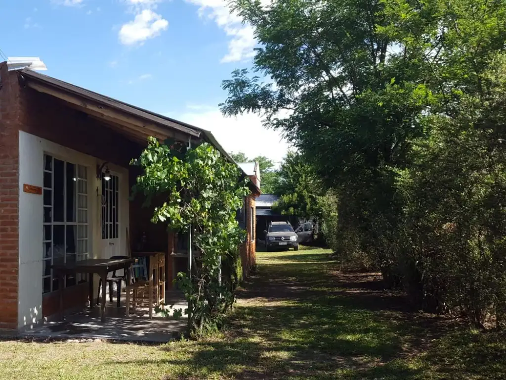 DOS PROPIEDADES EN UN LOTE  CON EXCELENTE UBICACION