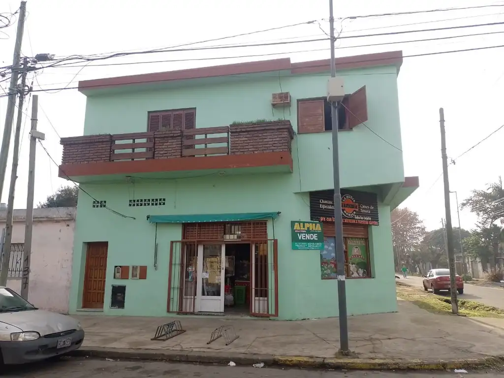 Departamento y local en venta