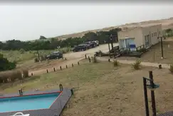 Áreas comunes piscina, club-house en Punta Medanos en Costa Atlantica