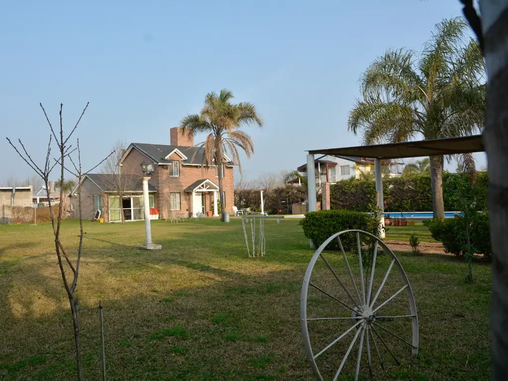 CASA 3 DORMITORIOS CON QUINCHO Y PILETA EN ROLDAN CERCA DE LIMITE CON FUNES. APTA CREDITO Y/O PERMUT