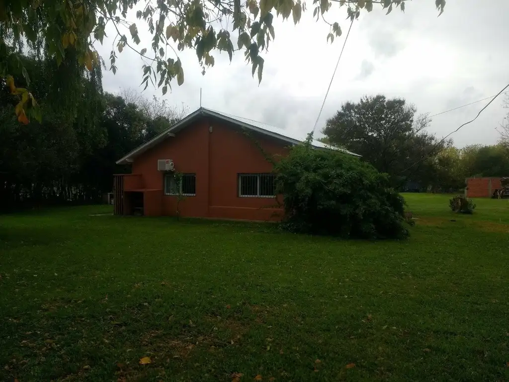 FRACCIONES CON 3 GALPONES EN UNA DE ELLAS Y LOTE LINDERO CON VIVIENDA EN OTRA