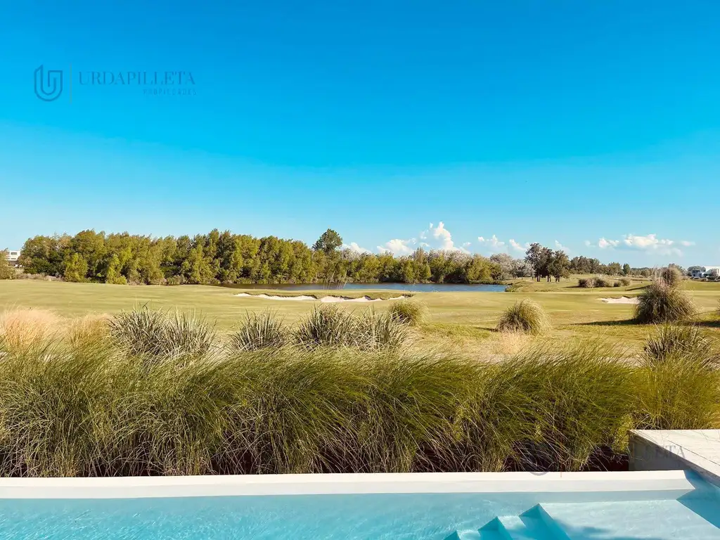 Casa para alquiler temporal o venta sobre golf y laguna en La Calesa - URDAPILLETA PROPIEDADES