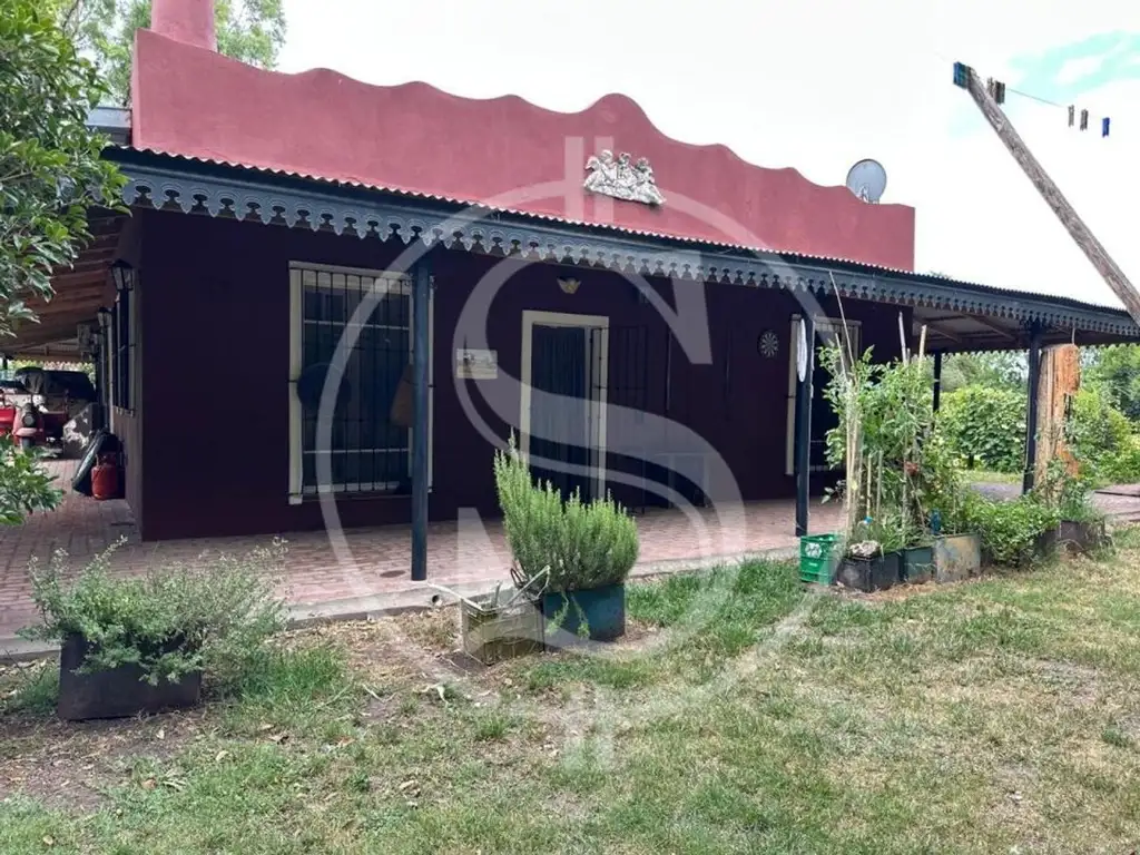 CAMPO CON 2 CASAS Y CABALLERIZA  DE 5.8 HECTAREAS