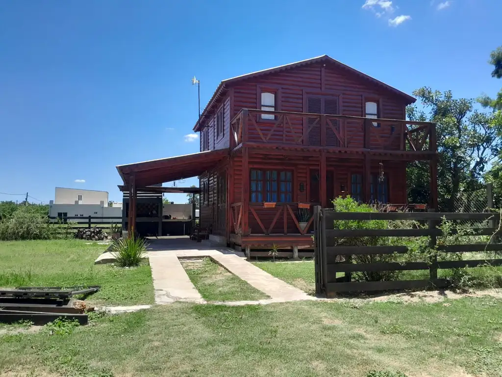 SE VENDE HERMOSA PROPIEDAD ESTILO MONTAÑA EN UN BARRIO EXCLUSIVO COSTA NOGALES