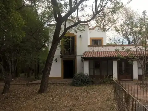 CASA + CABAÑAS + PILETA + RIO + TERRENO