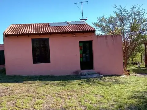 SE VENDE CASA MAS DOS HECTAREAS   CERCADAS EN NONO