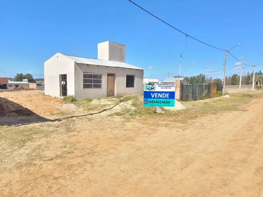 Lote en excelente zona con construcción a terminar