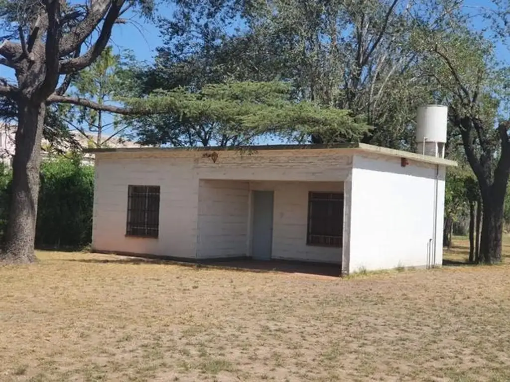 Terreno con casa y galpon